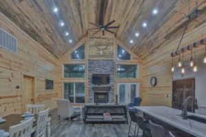 Yeti’s Nest – (Broken Bow, OK) - kitchen, dining area and family room on a single frame