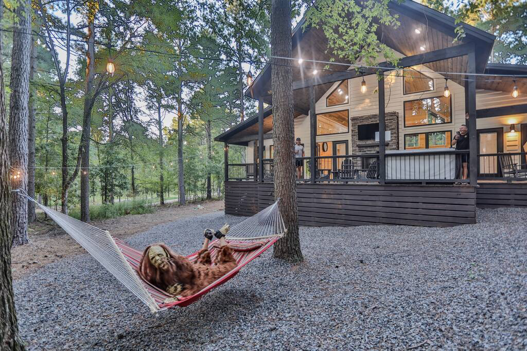 yeti relaxing outside the house