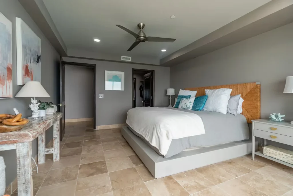 bedroom with a double bed and a small table