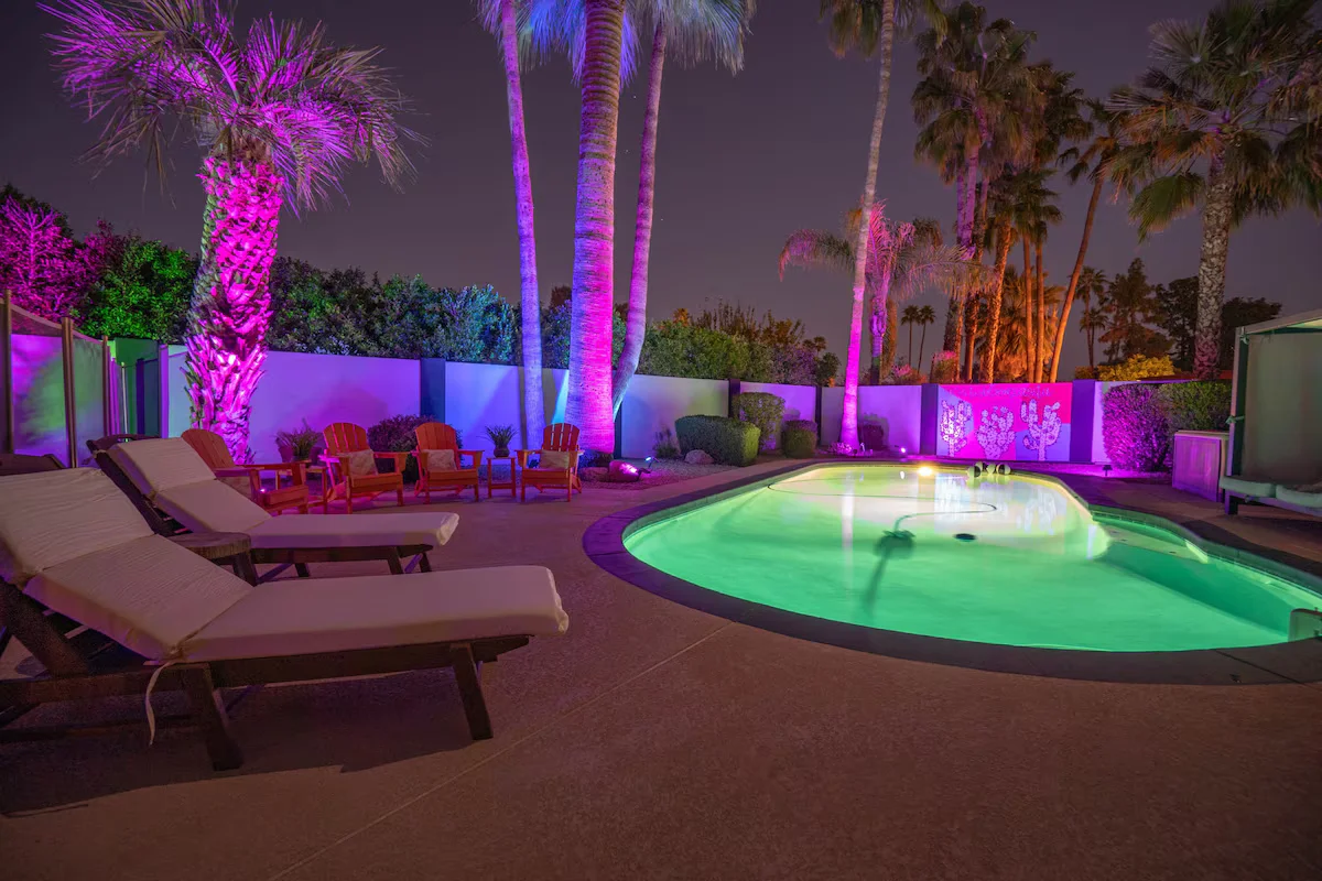 backyear pool in Scottsdale Retreat (Scottsdale, AZ) with relaxing chairs and other sitting chairs