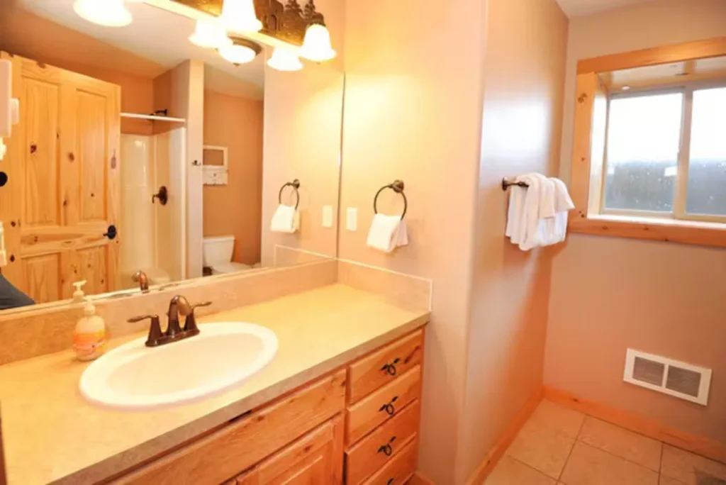 Bear Creek (YellowStone, ID) - bathroom vanity area