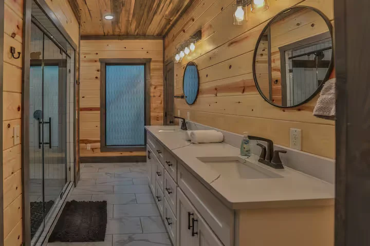 Sasquatch Sanctuary (Broken Bow, OK) - bathroom with double vanity