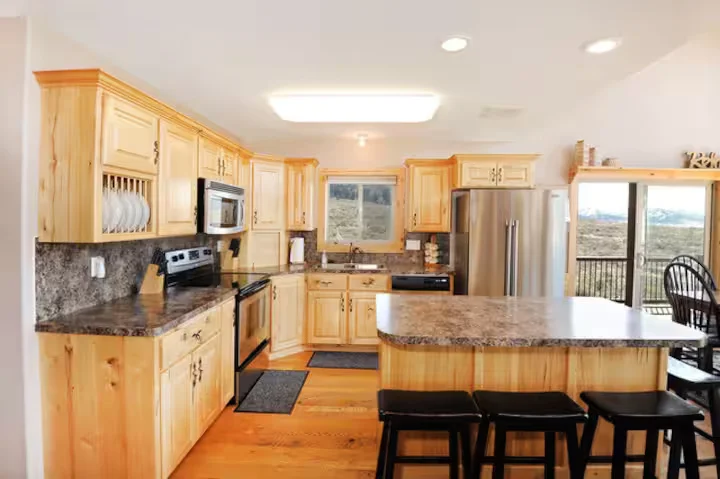 Bear Creek (YellowStone, ID) - kitchen area with a counter