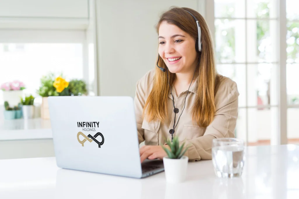 a middle-aged women smiling while working